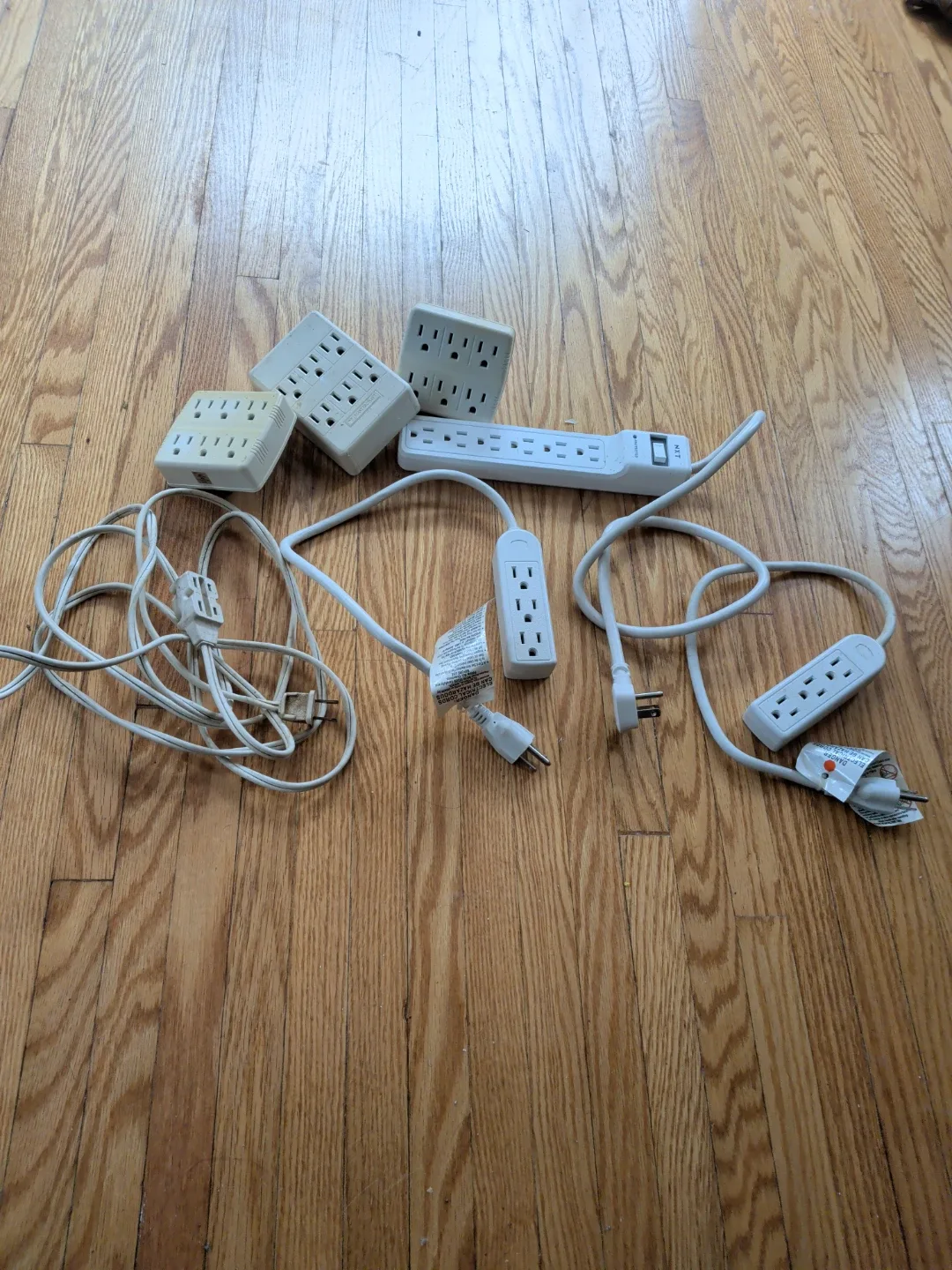 Set of Seven Power Bars and Outlet Adapters