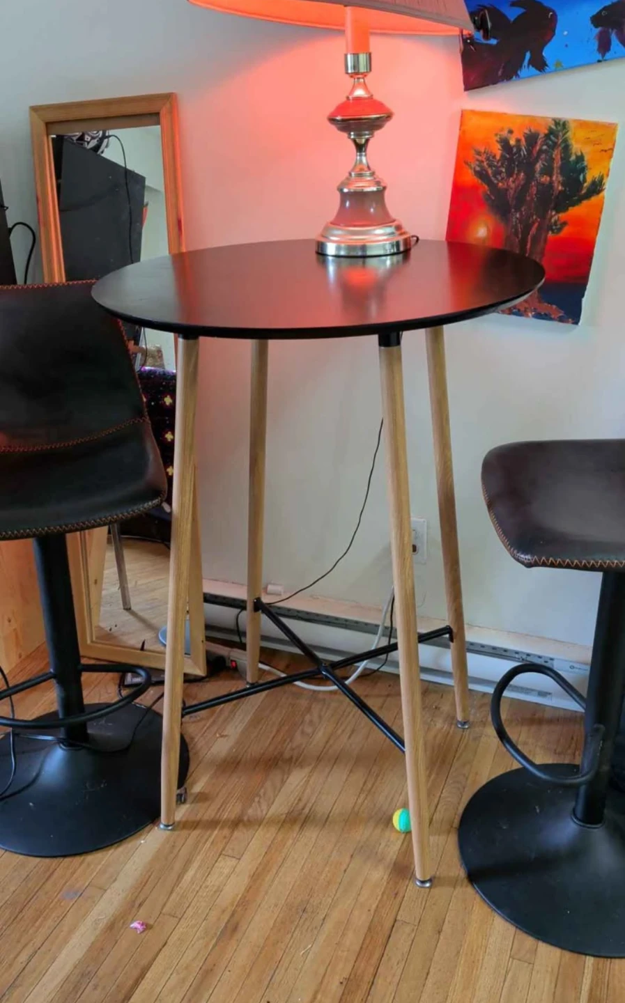 Two Black Bar Stools, and Table.