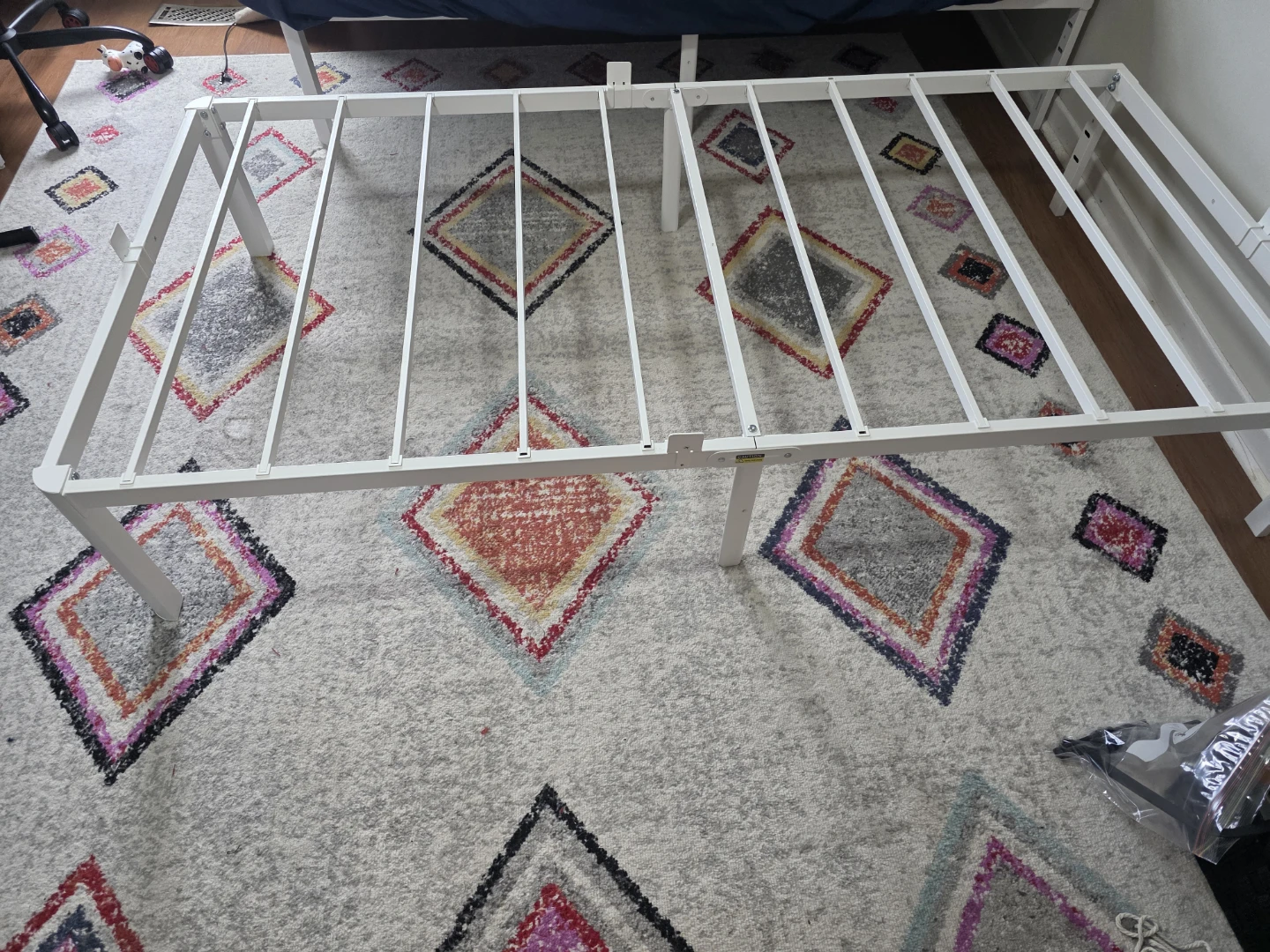 White metal single bed frame