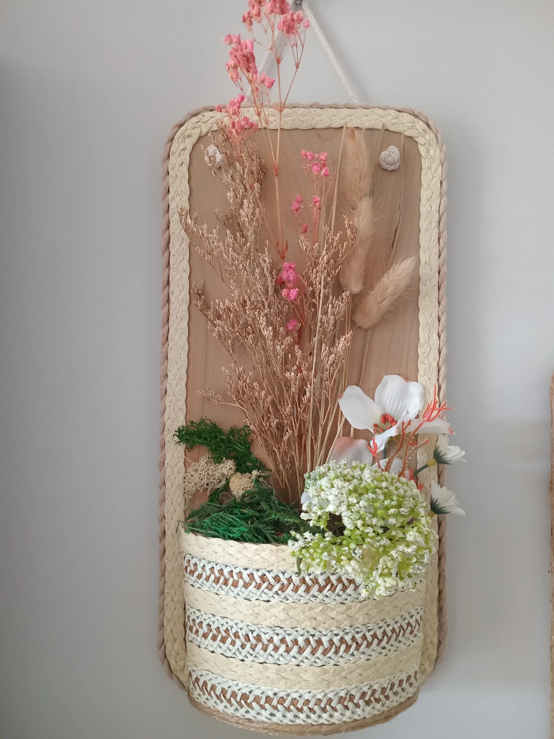 Wall hanging dried floral arrangement