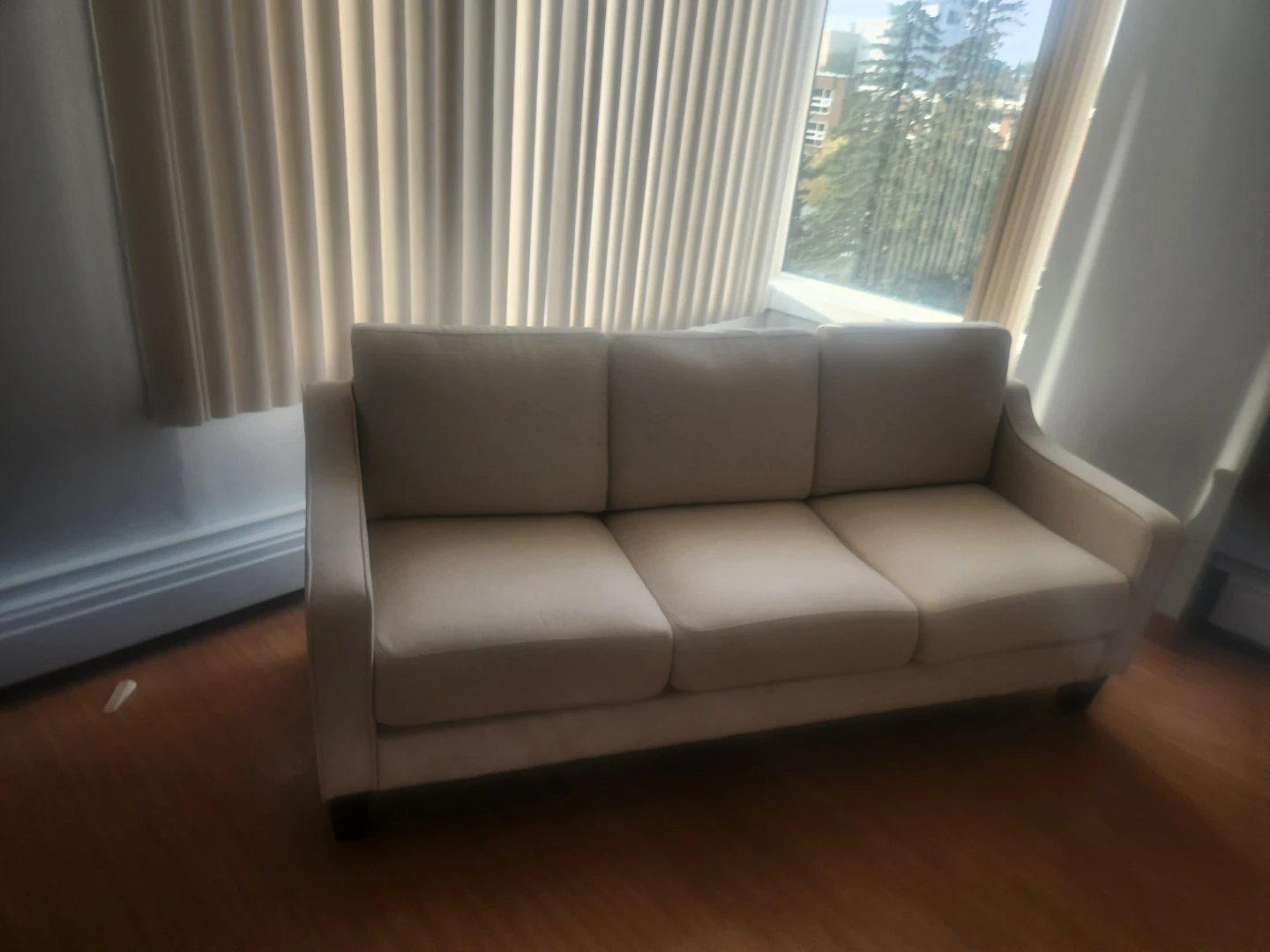 Cream Three-Seater Sofa