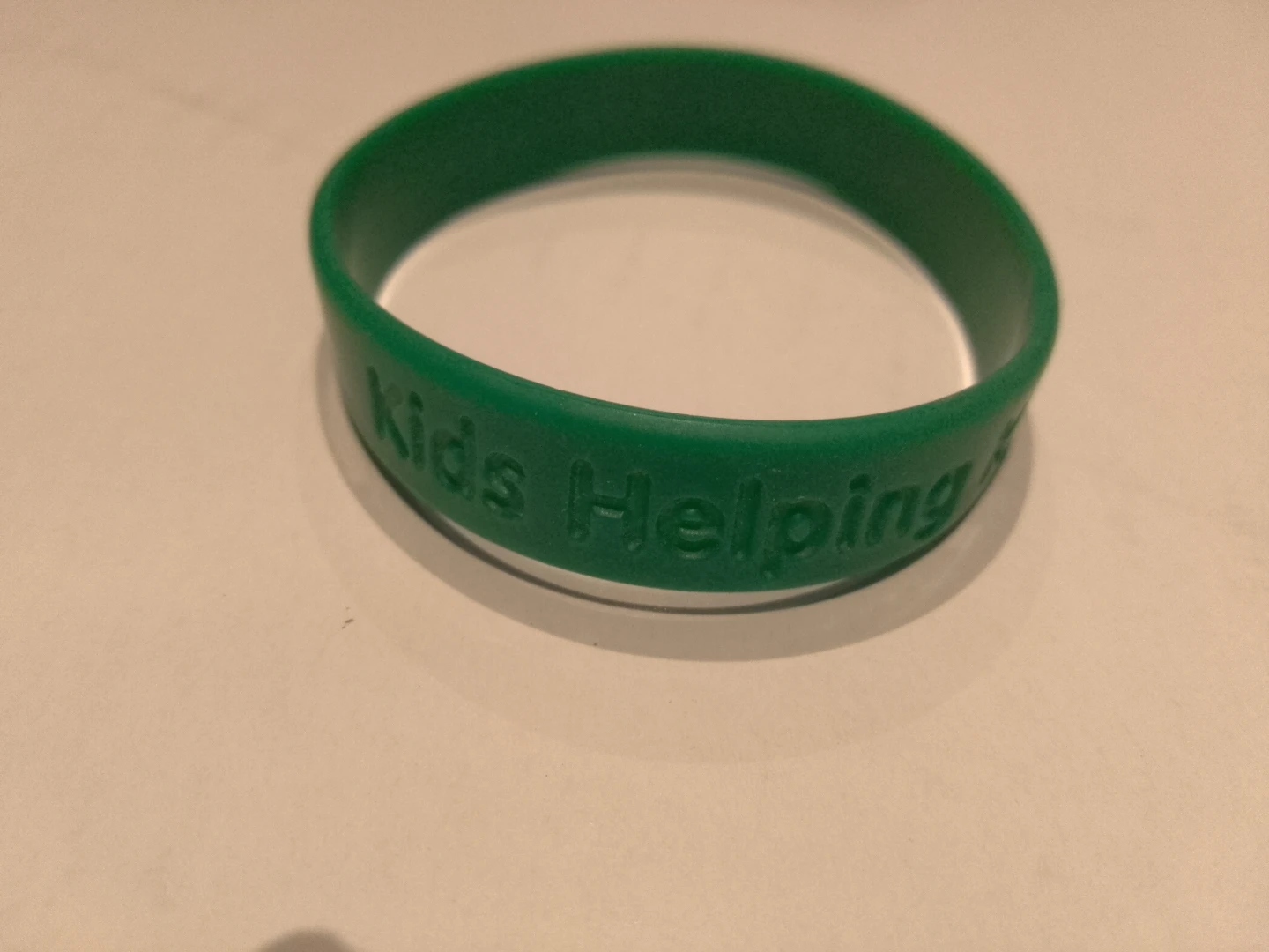 Kids Helping Kids Silicone Wristband 🏈