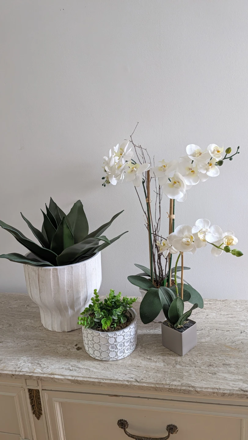 Set of four artificial potted plants