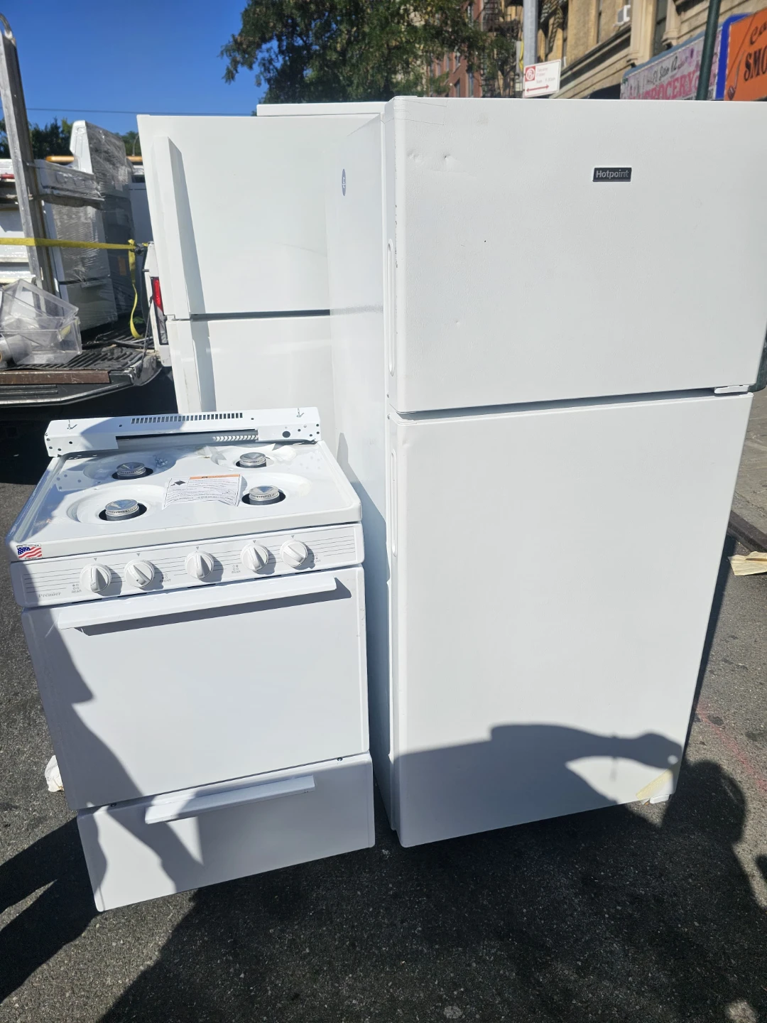 New Hotpoint Refrigerator and Premier Gas Range