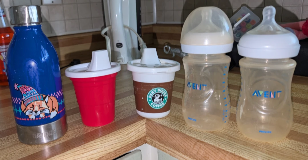 Assorted Baby Bottles and Drinking Cups
