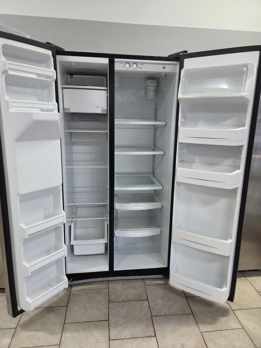 GE Stainless Steel Side-by-Side Refrigerator - photo 2