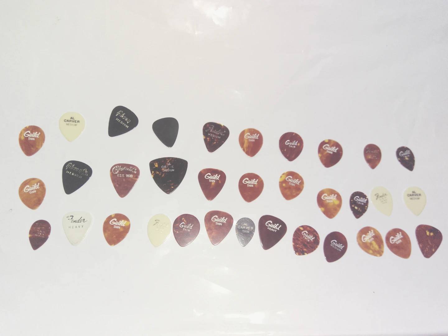Assorted Guitar Picks vintage Including Guild and Fender