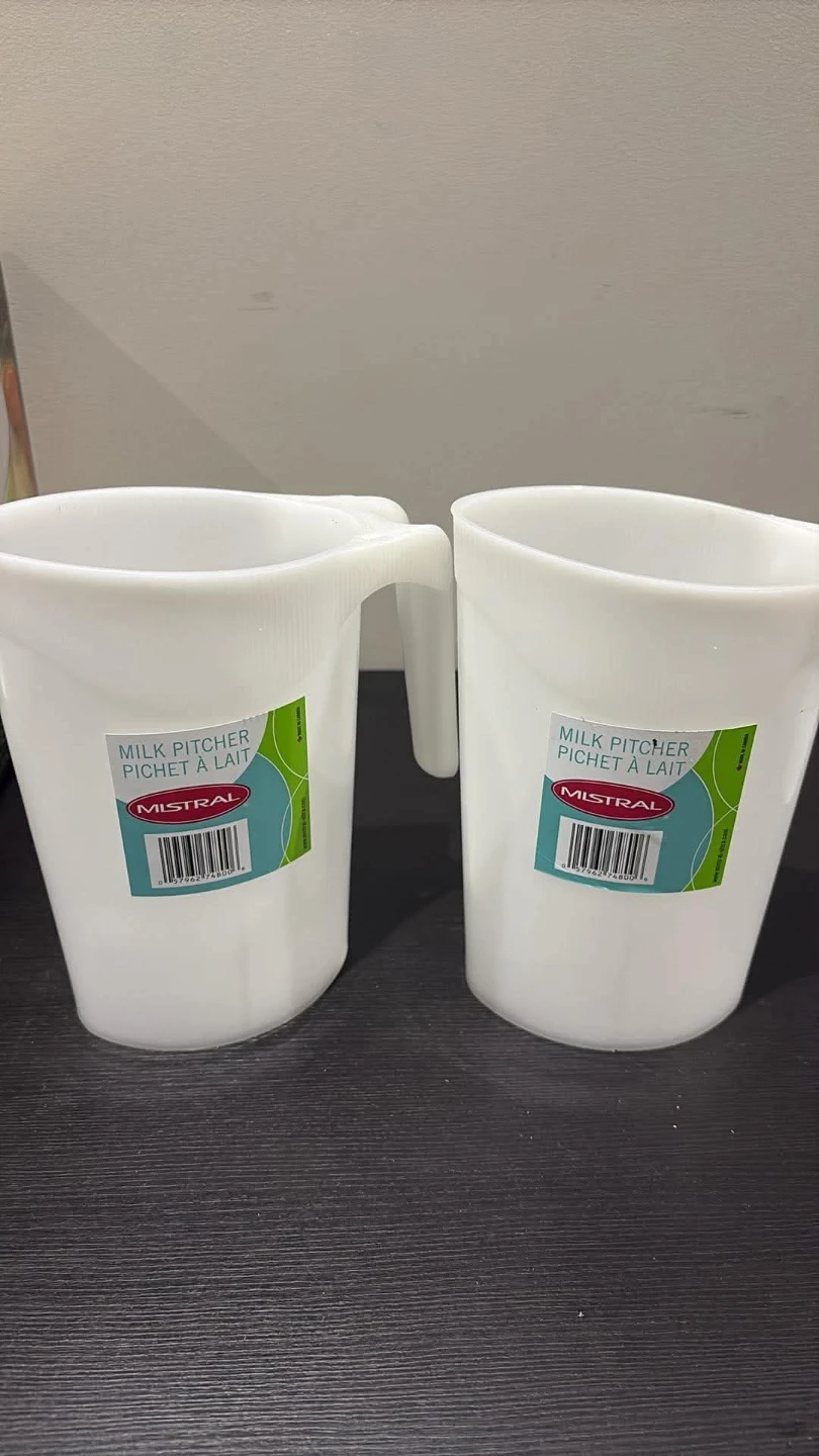 Two Mistral Milk Pitchers