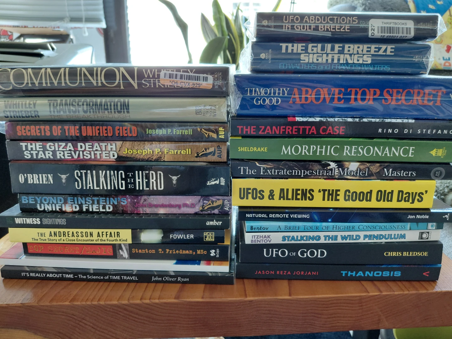 Collection of Books on UFOs and Paranormal Subjects