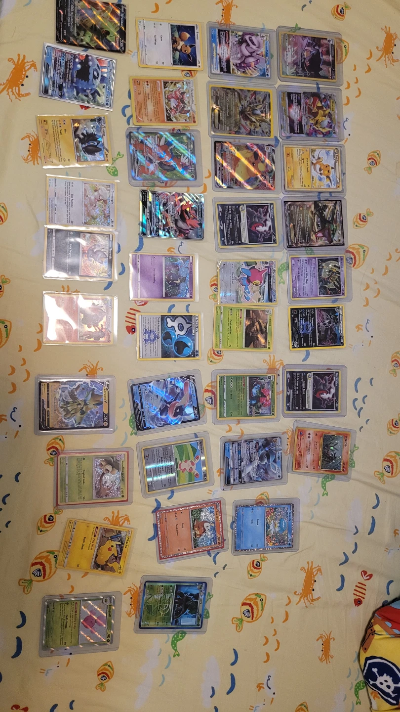 Large Collection of Assorted Pokemon Trading Cards