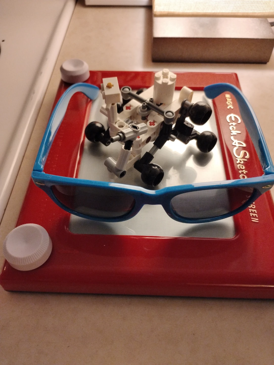 Used Etch a Sketch, New BMO Sunglasses, & LEGO Mars Rover