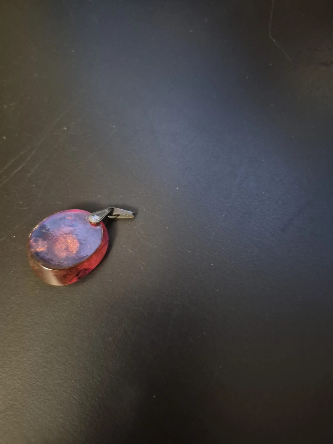 Amber and resin pendant