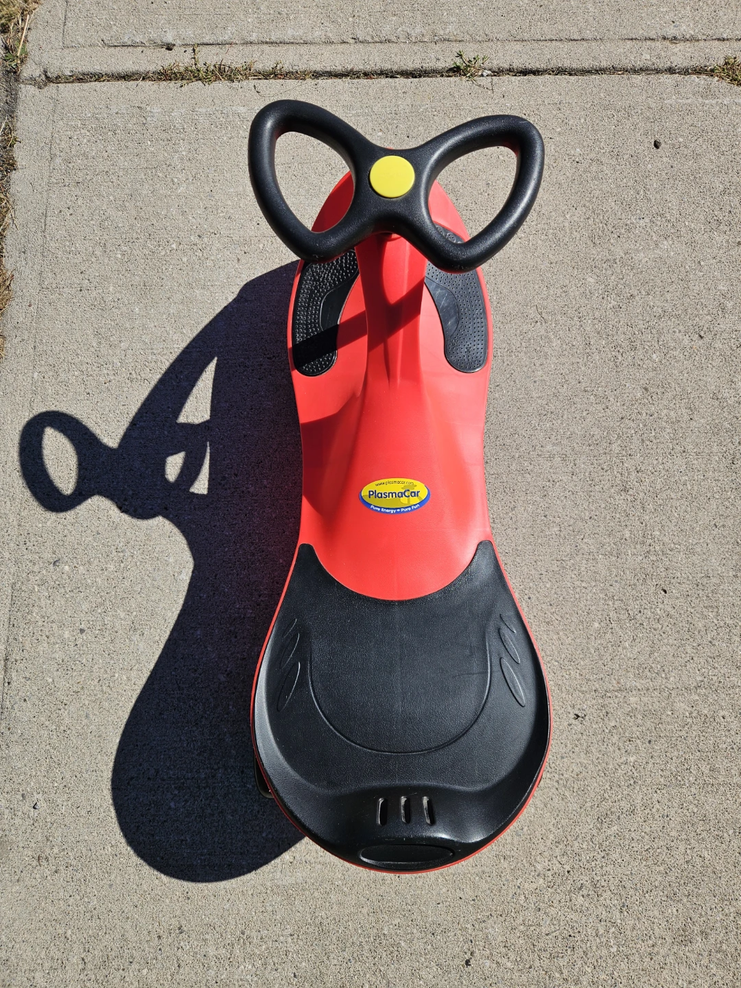 PlasmaCar ride-on toy in red