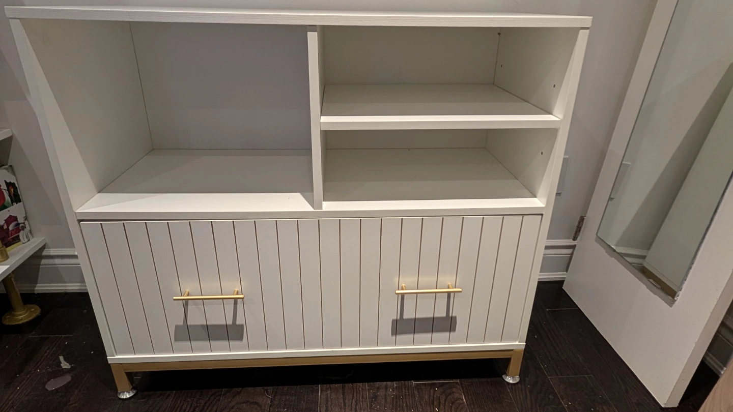 White Storage Cabinet with Gold Hardware