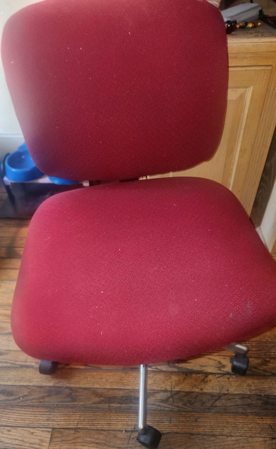 Red rolling office chair