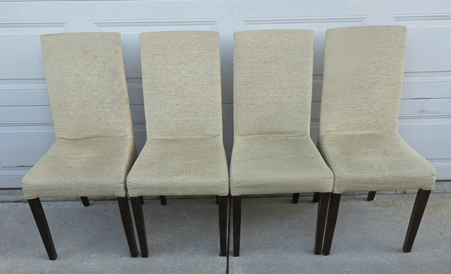Beige Upholstered Parsons Dining Chairs. 4 w Dark Wood Legs.