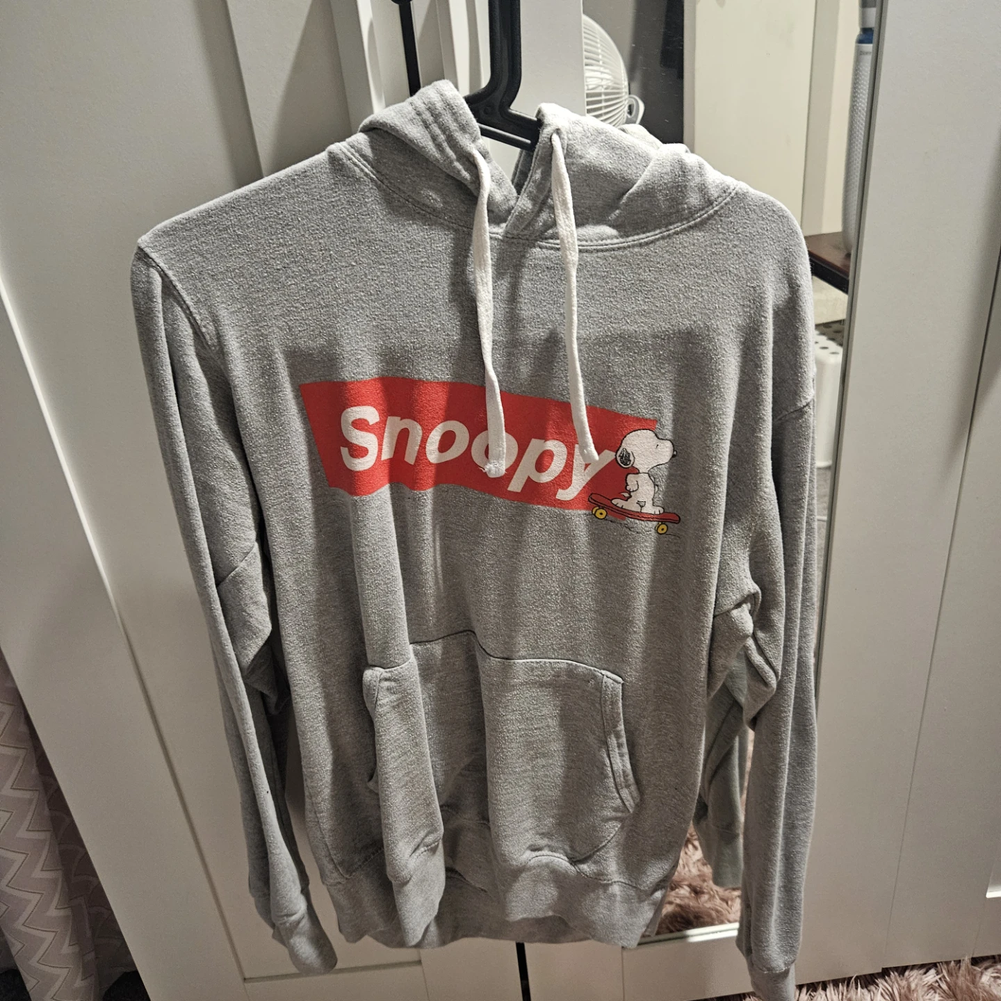 Assorted hoodies and denim vest