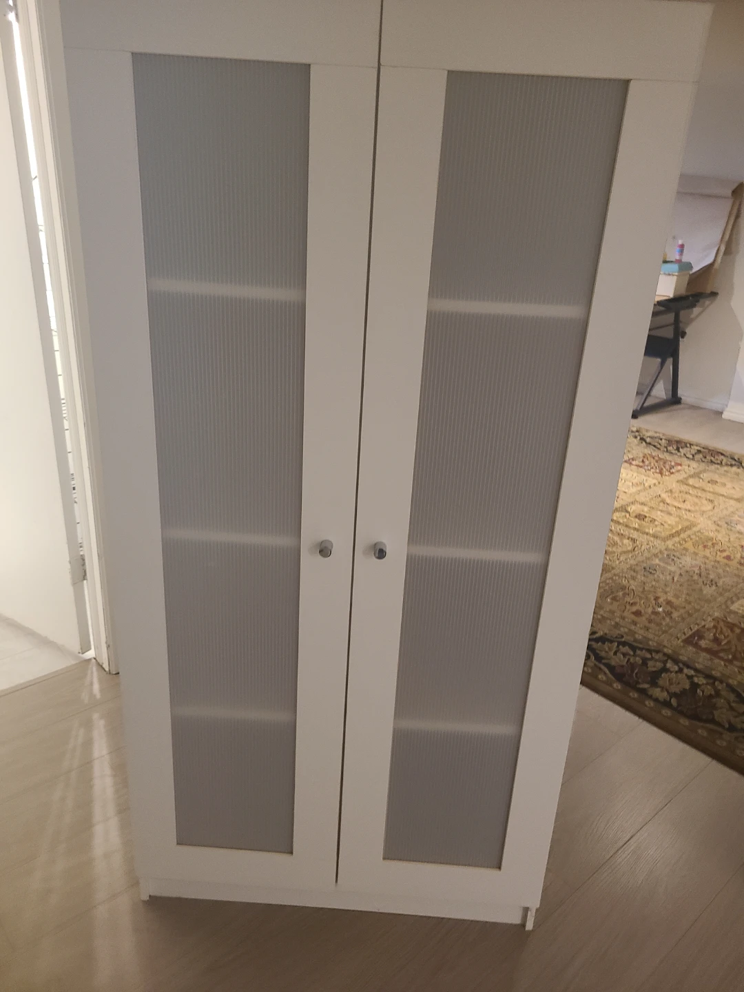 White IKEA cabinet with frosted glass doors - photo 2