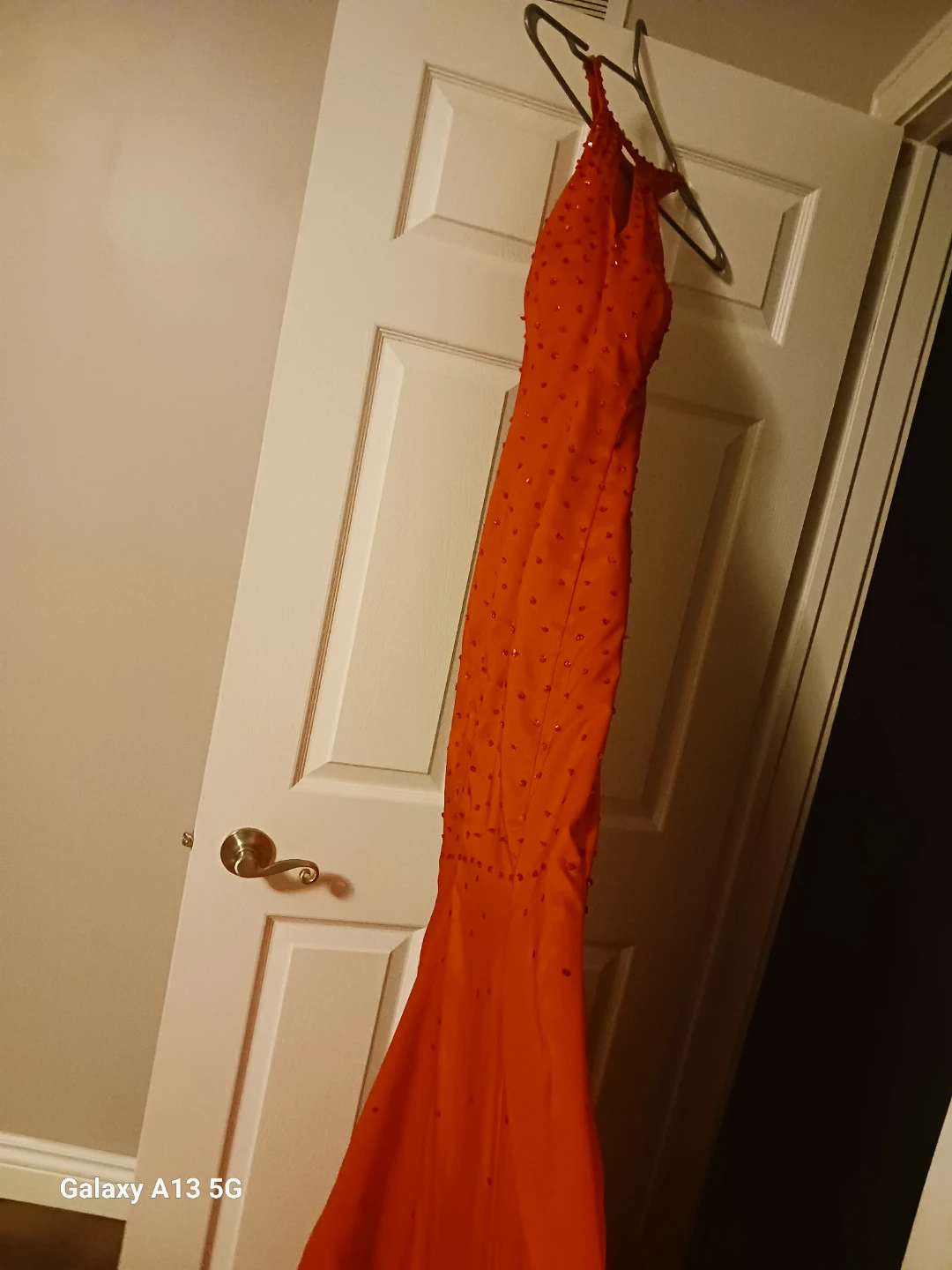 Red beaded formal gown