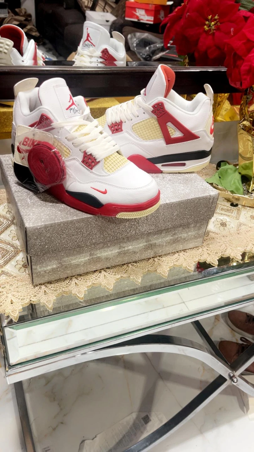 Nike Air Jordan 4 Retro Fire Red Sneakers - photo 4
