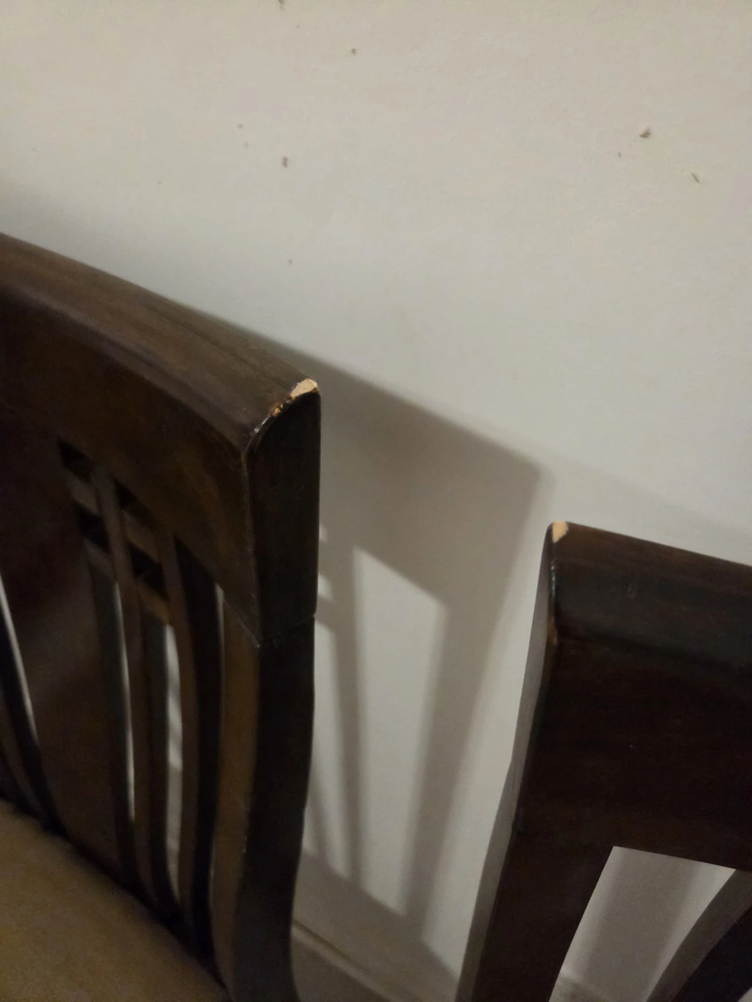 Three dark wood dining chairs - photo 4
