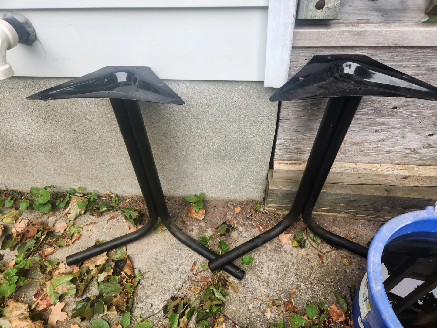 Two Black Metal Table Legs