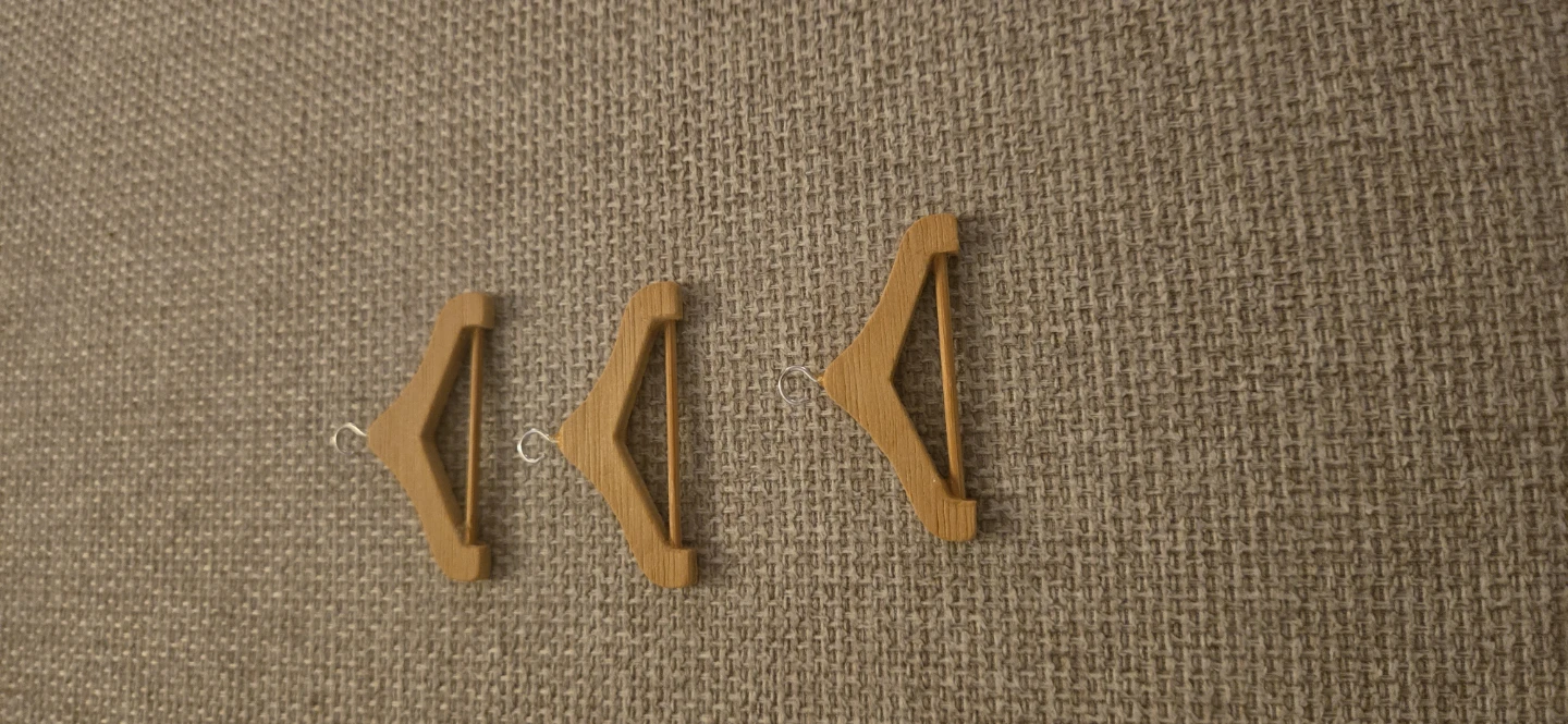 Three Miniature Wooden Hangers