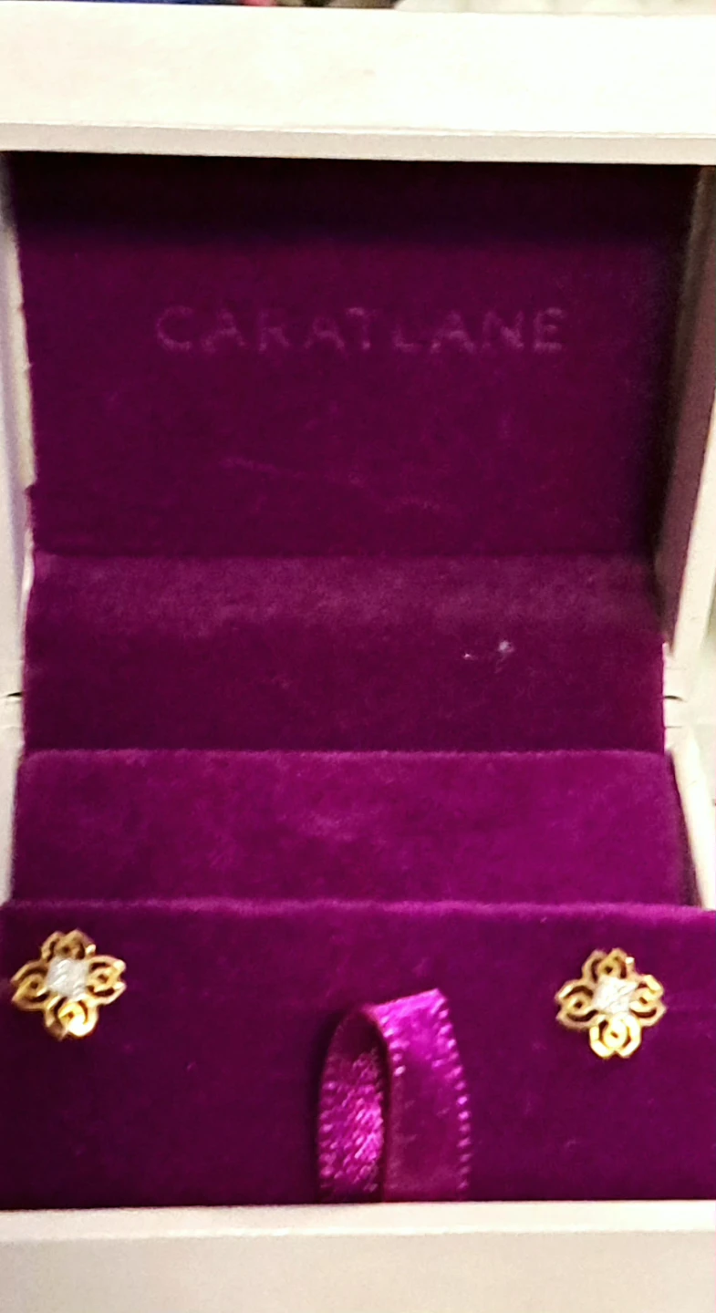 CaratLane real gold and diamond stud earrings