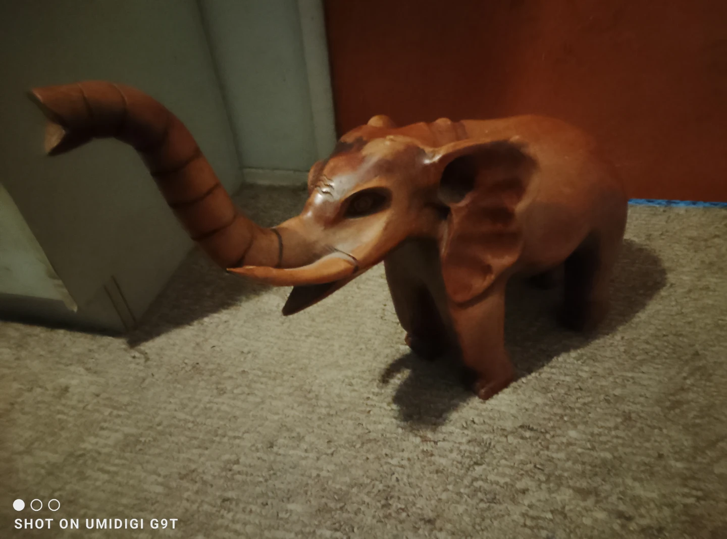 Hand-carved wooden elephant statue