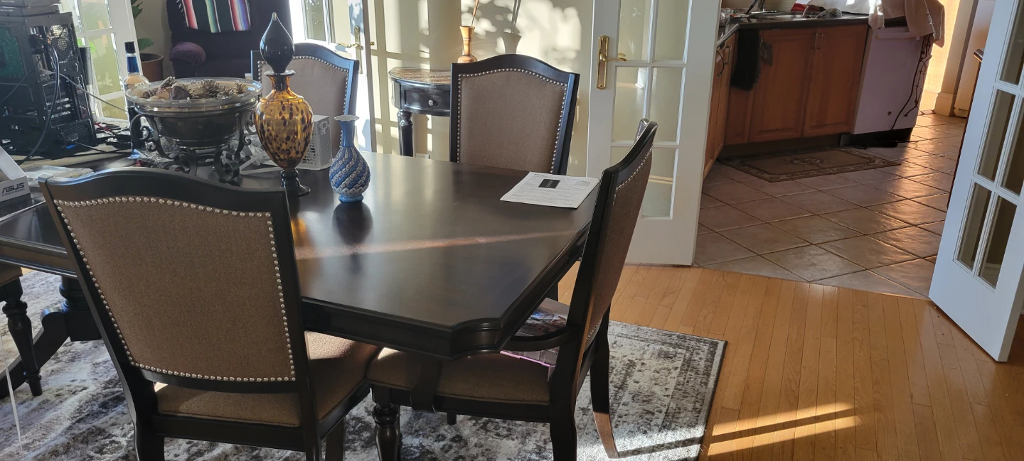Dark Wood Dining Table with Upholstered Chairs
