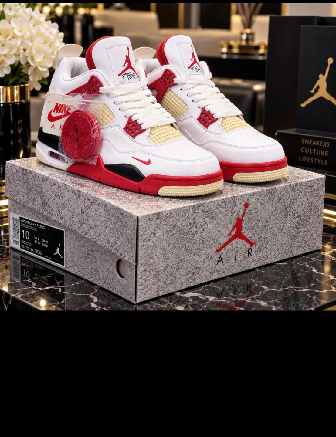 Nike Air Jordan 4 Retro Fire Red Sneakers - photo 2