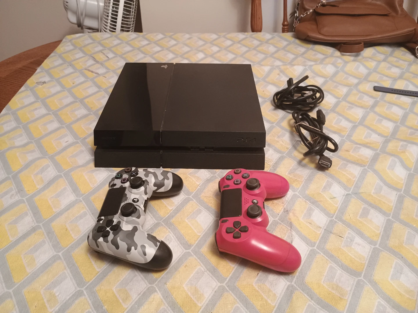 Sony PlayStation 4 Console with 2 Controllers
