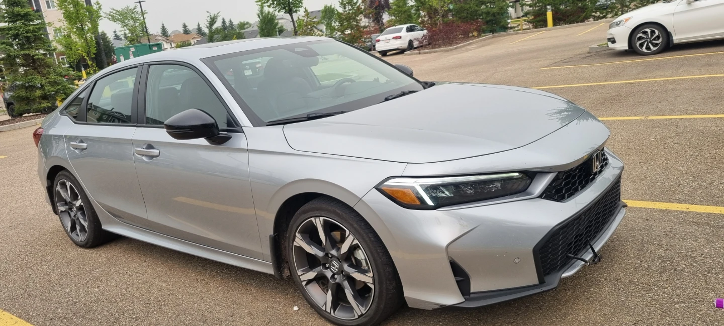 Honda civic touring hybrid sports 2025