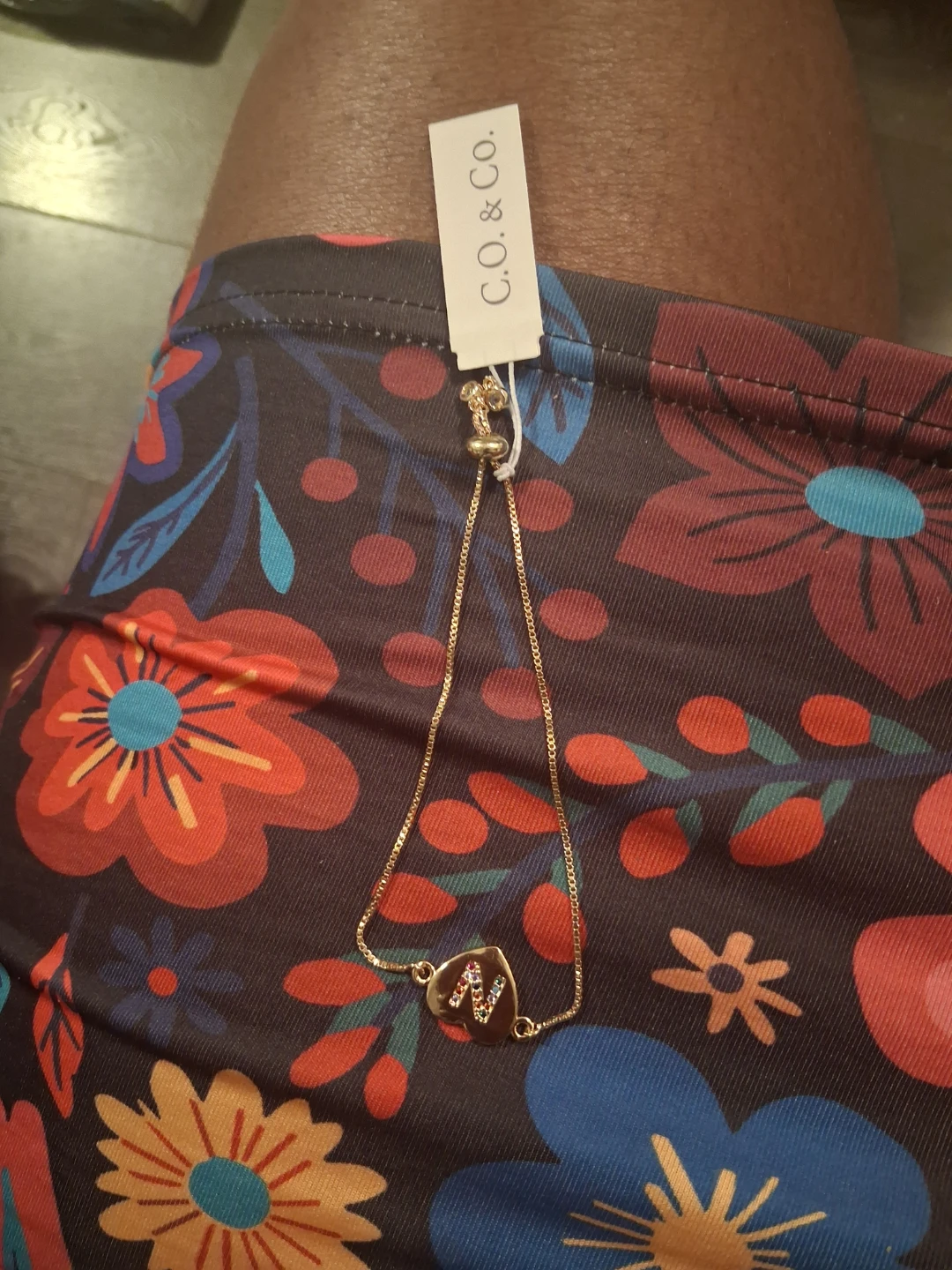 C.O. & Co. Gold Tone Bracelet with 'N' Charm