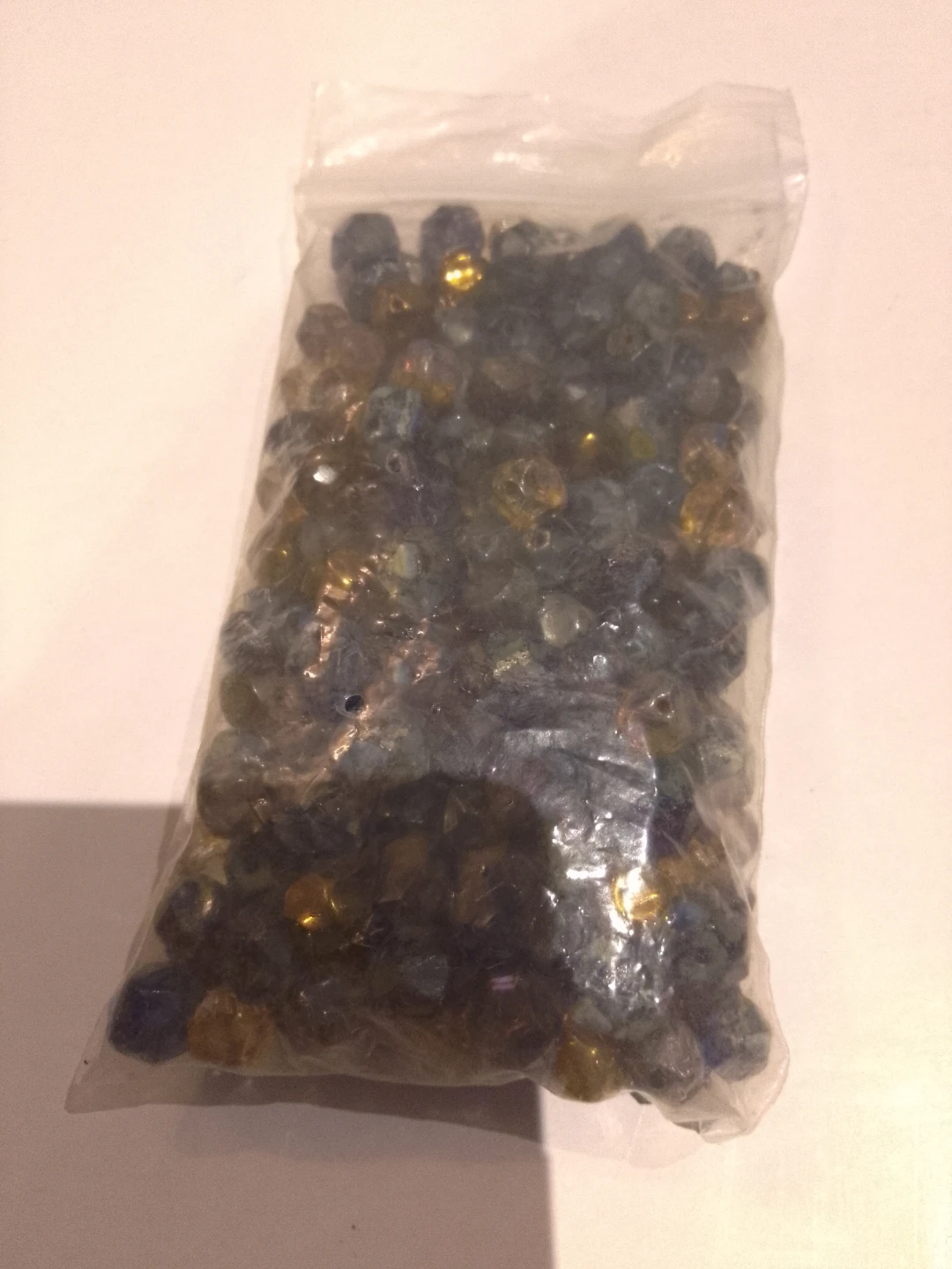 Assorted Blue and Gold Faceted Beads 🏈