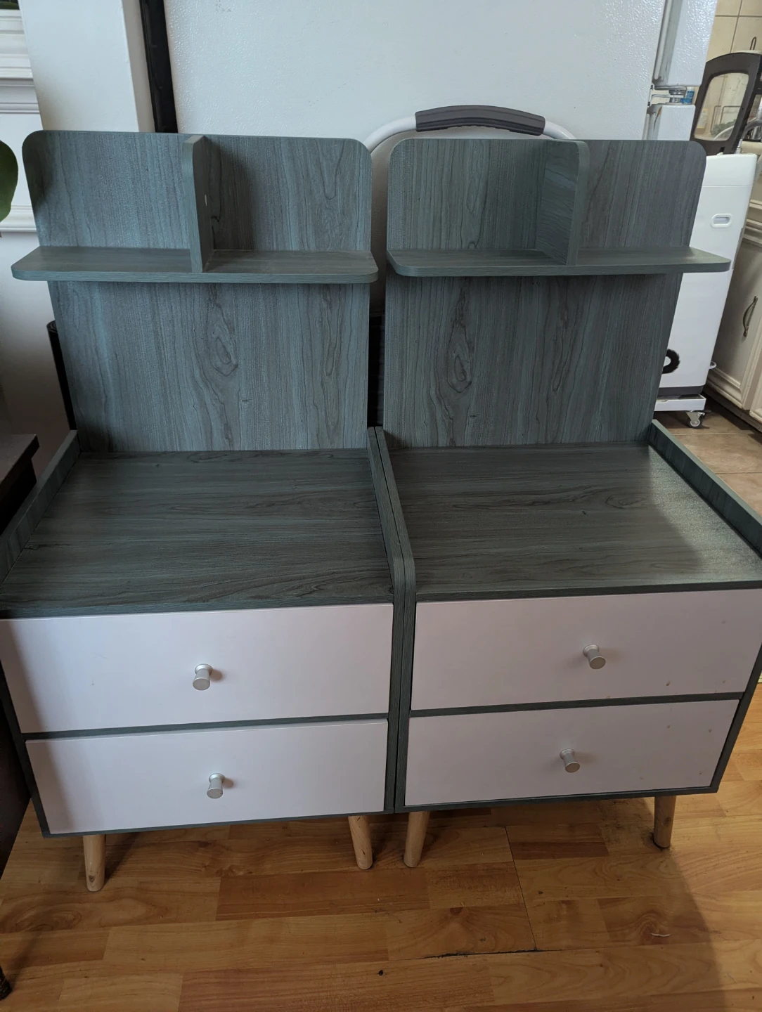 Two bedside tables with shelves and drawers