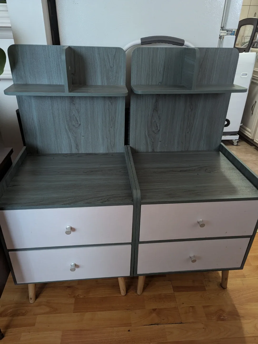 Two bedside tables with shelves and drawers