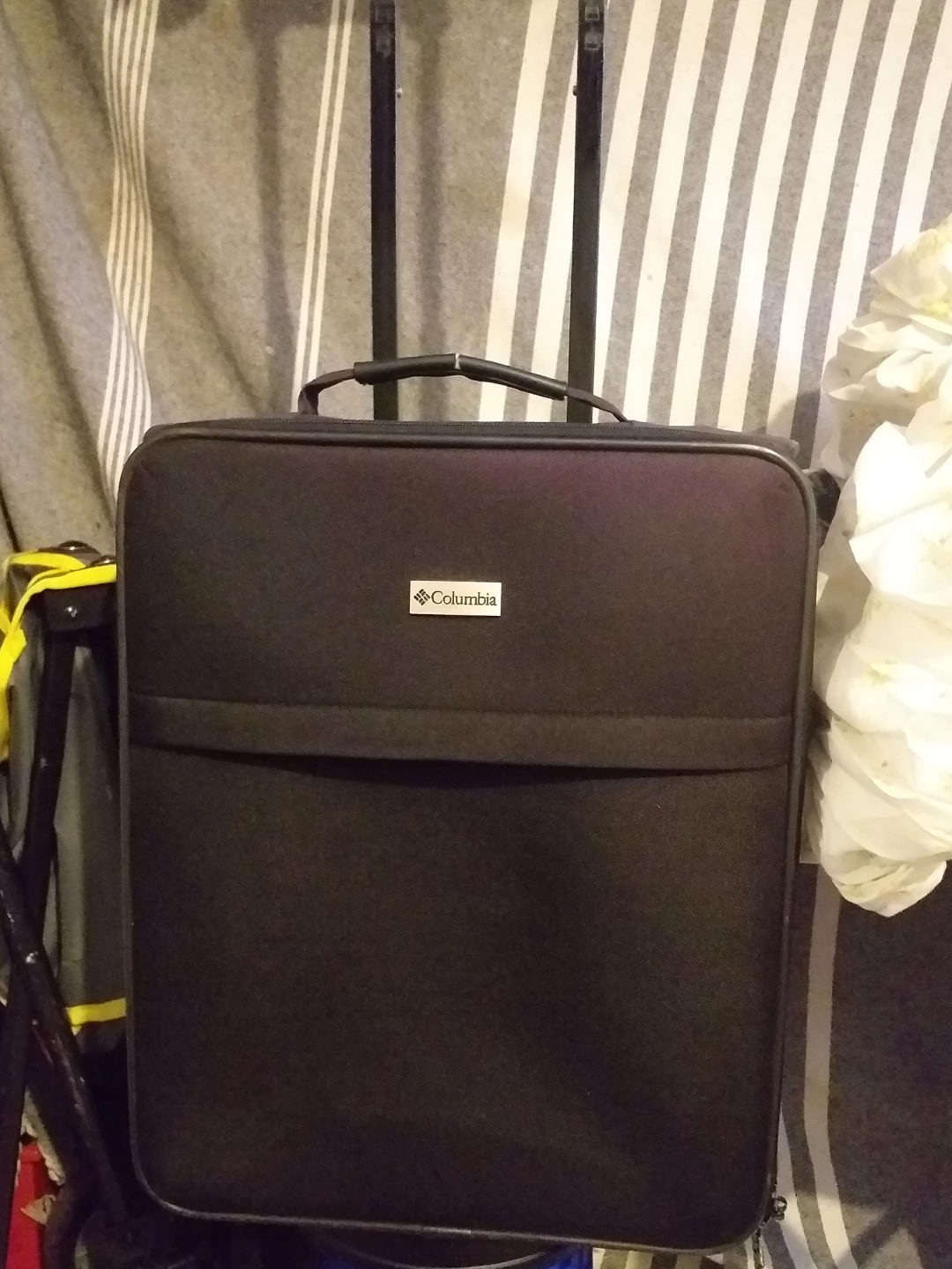 Columbia black rolling carry-on luggage