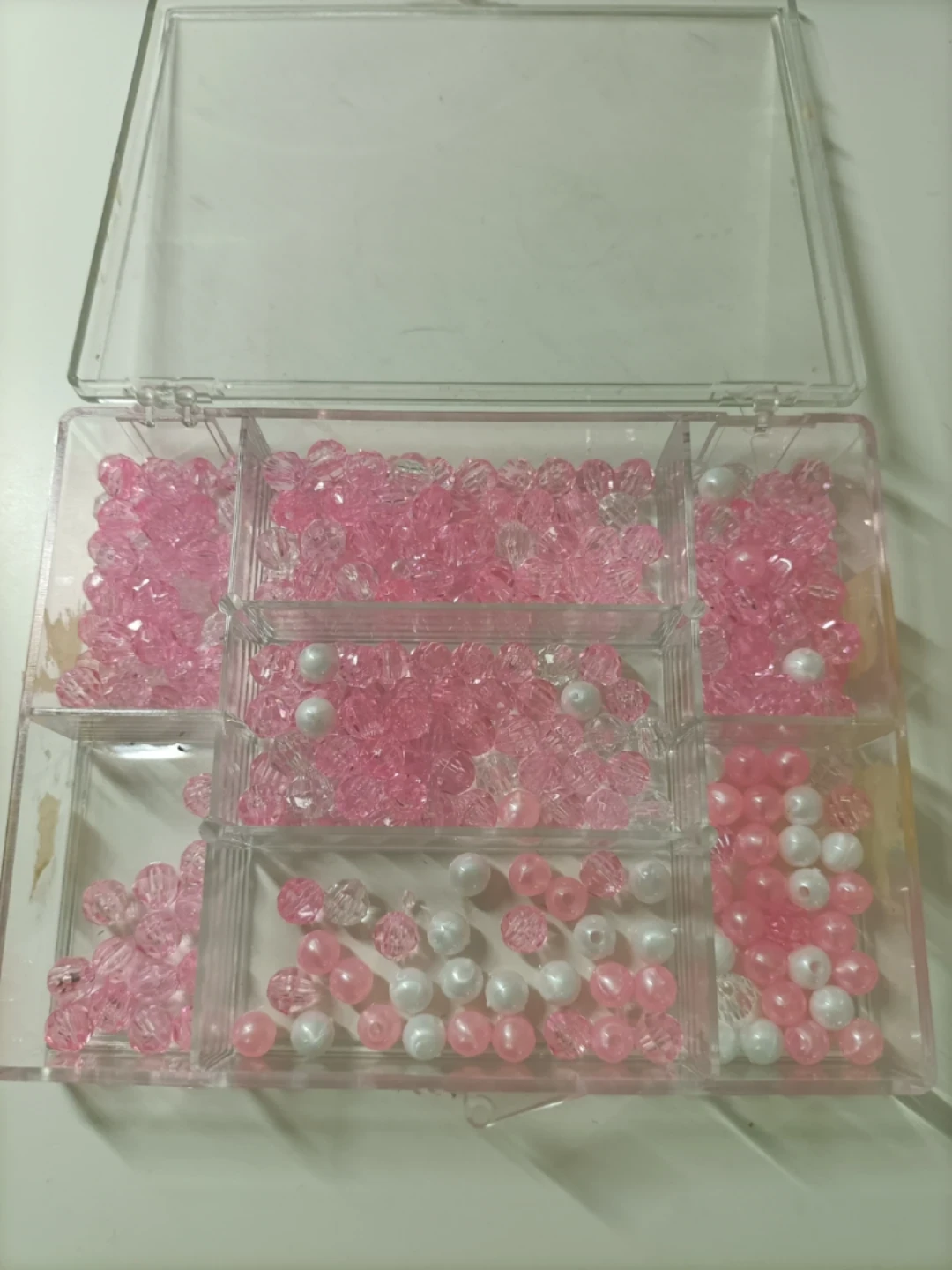 Clear Plastic Organizer Box with Assorted Pink Beads 🏈