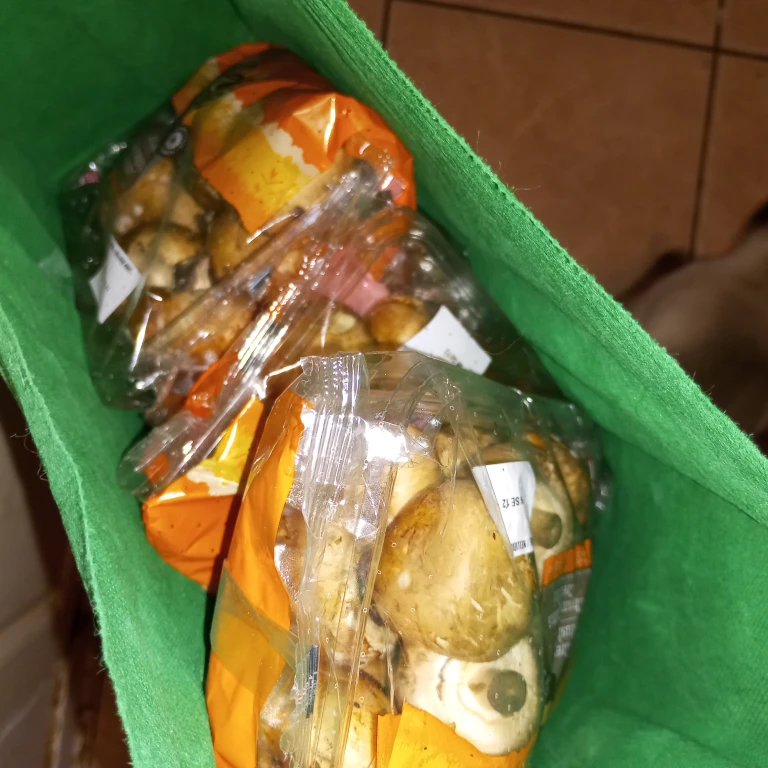 Multiple packages of Belle Grove Cremini Mushrooms