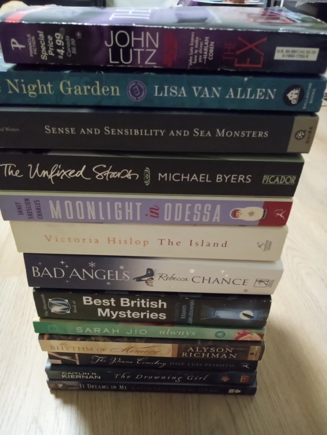 Assorted collections books $15 stack. Moving sales