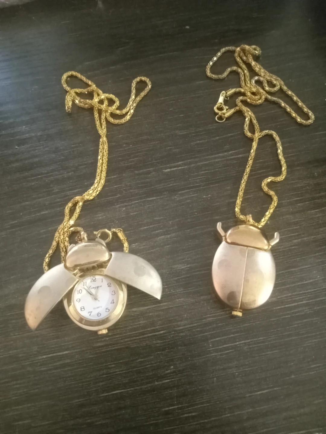 Longines beetle pendant watches