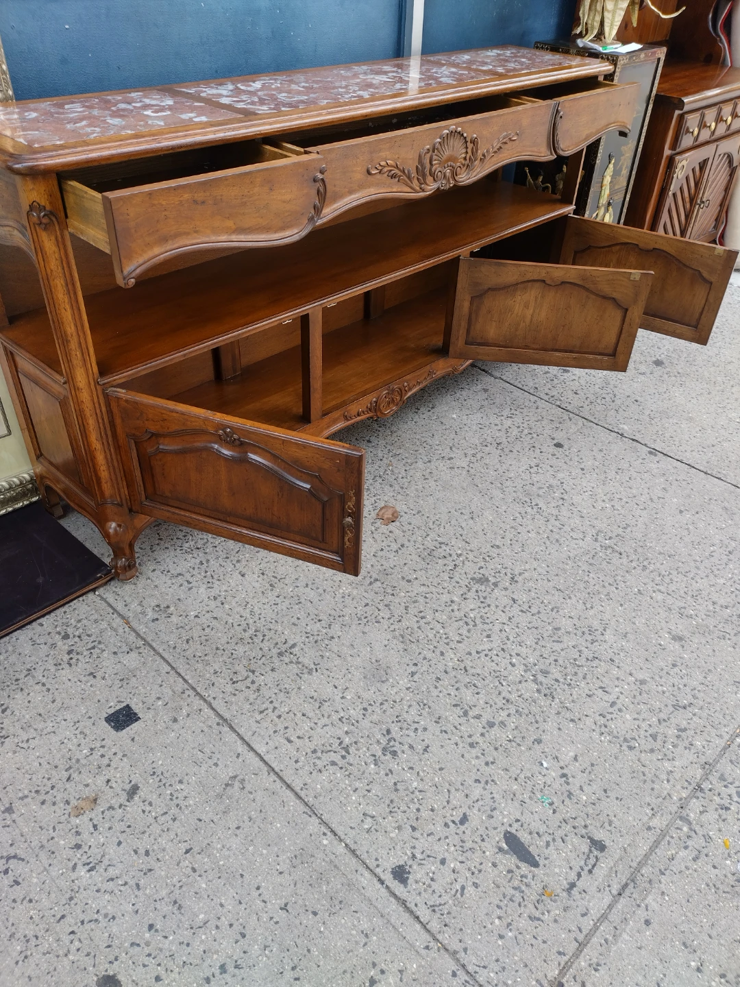 Long buffet table with marble on top