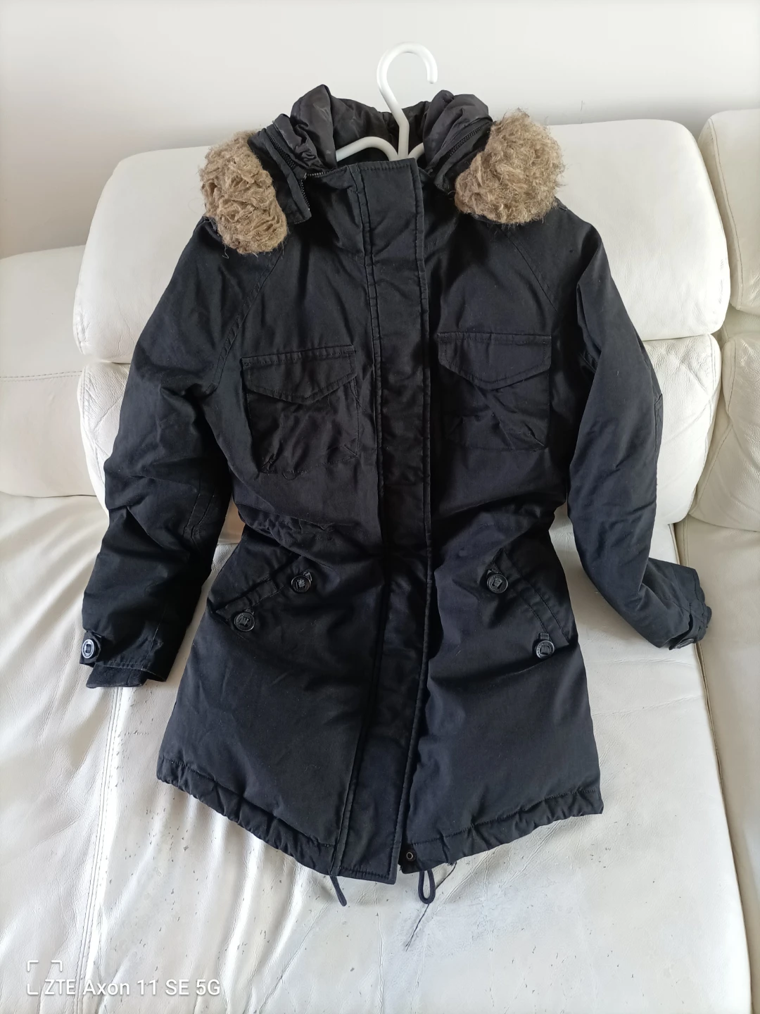 Community black parka with faux fur hood