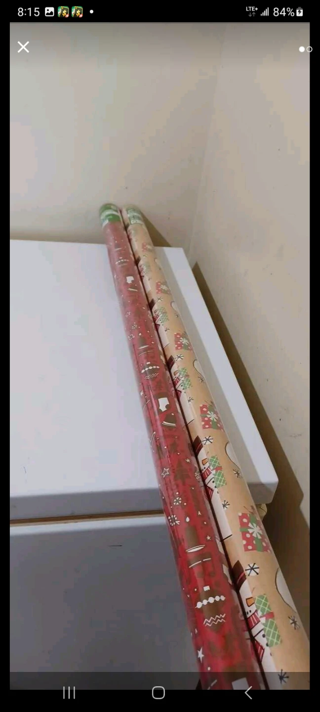 Two Rolls of Christmas Wrapping Paper