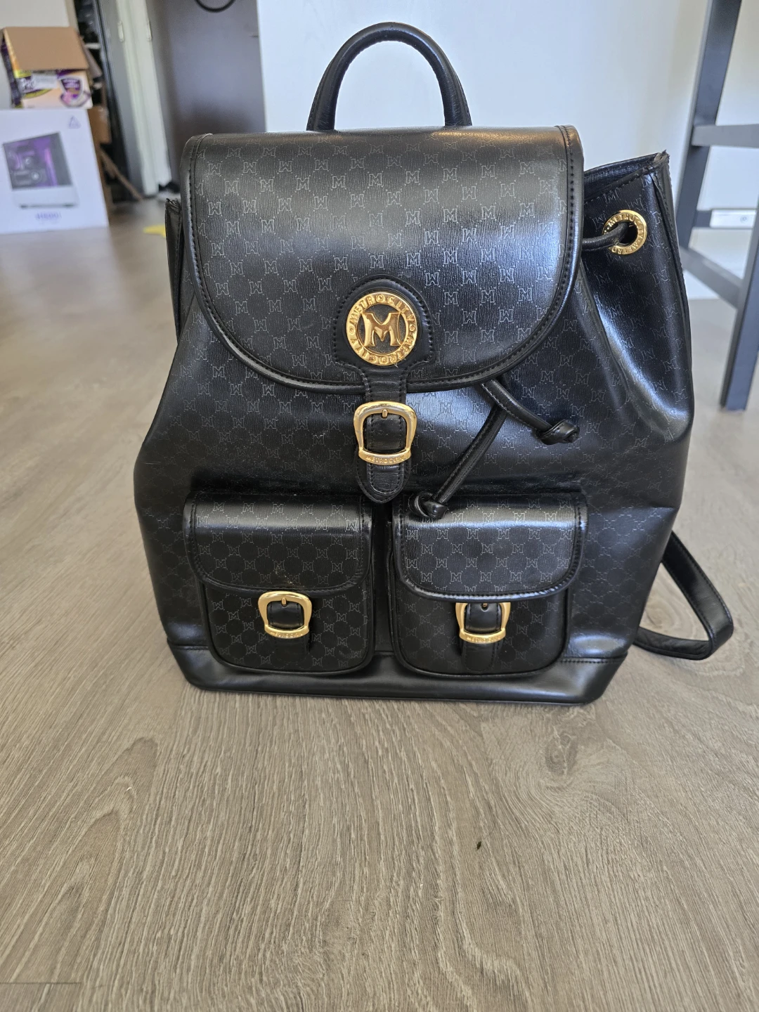Metrocity Black Monogram Backpack