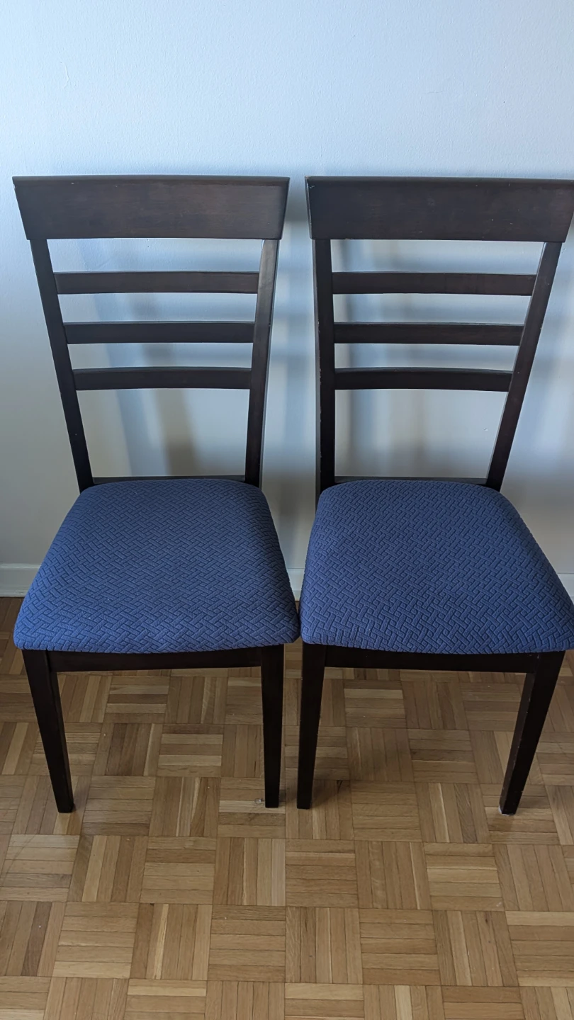 Two Dark Wood Dining Chairs with Blue Fabric Seats