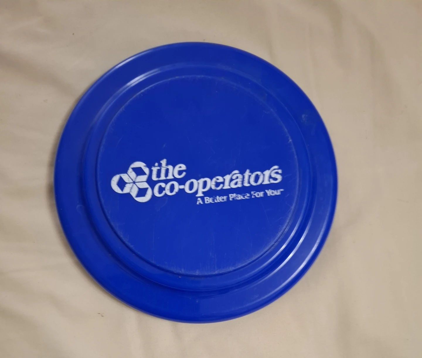 The Co-operators Blue Frisbee