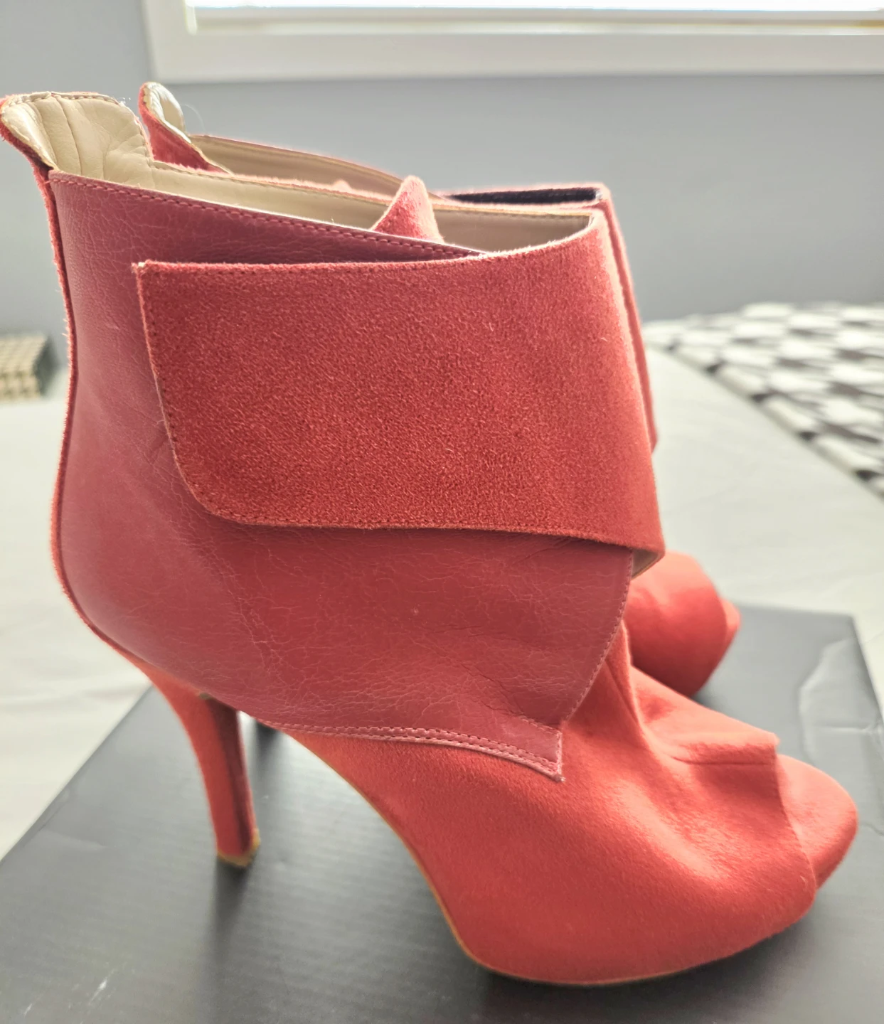 Red suede peep-toe stiletto booties
