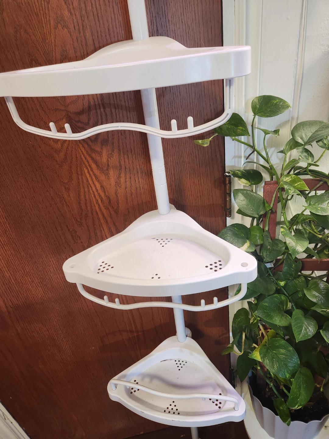 Tension pole shower caddy